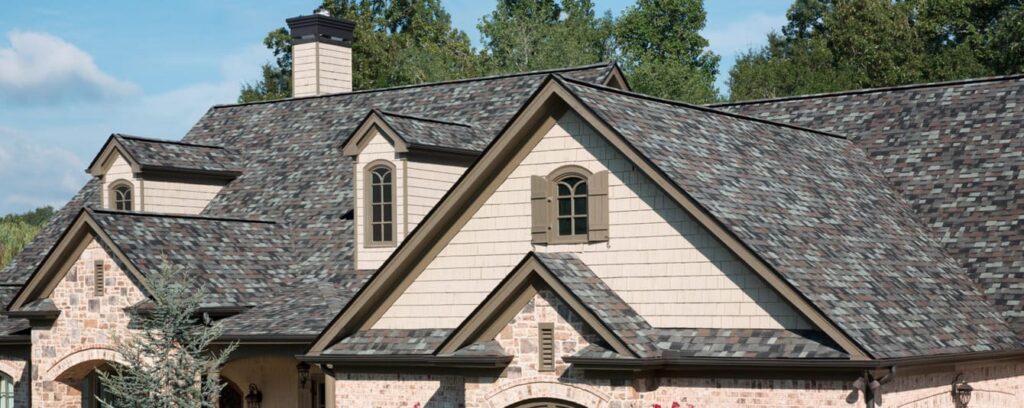 An image of shingle roof showing pitch and style