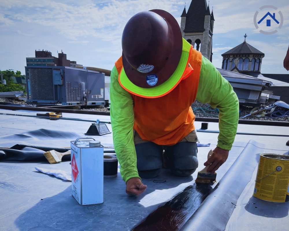 An image of an expert working on a commercial roof repair