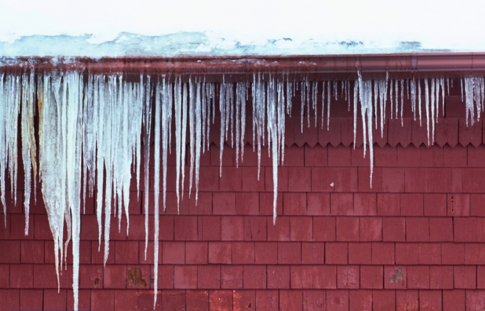 ice dam formed below the gutter