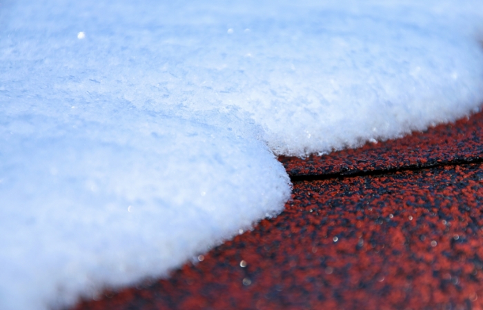 asphalt shingle roof with snow