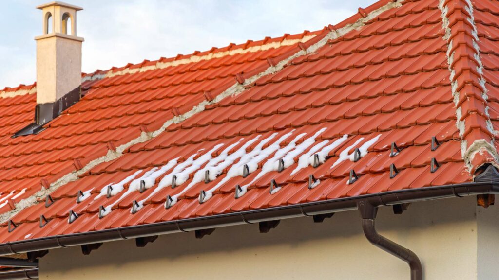 Snow Guards for Metal Roofs: Benefits and Installation Guide