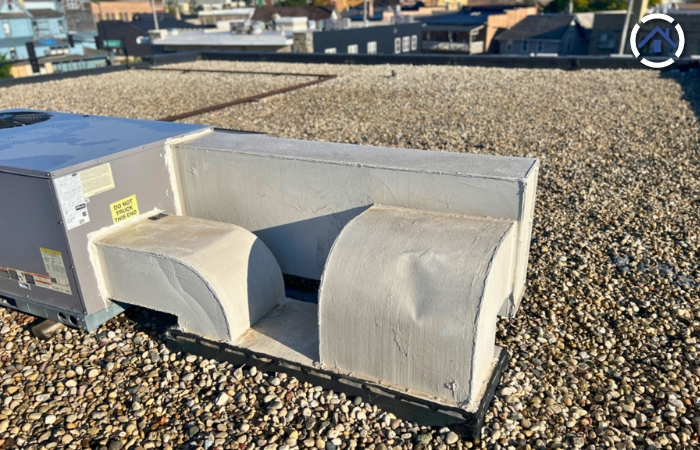 A ballasted EPDM roof which uses loose materials like gravel or pavers to secure a durable synthetic rubber membrane, offering protection and stability for flat or low-sloped roofs
