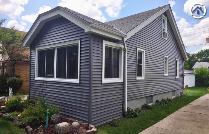 A gray vinyl siding newly installed on a Wisconsin home